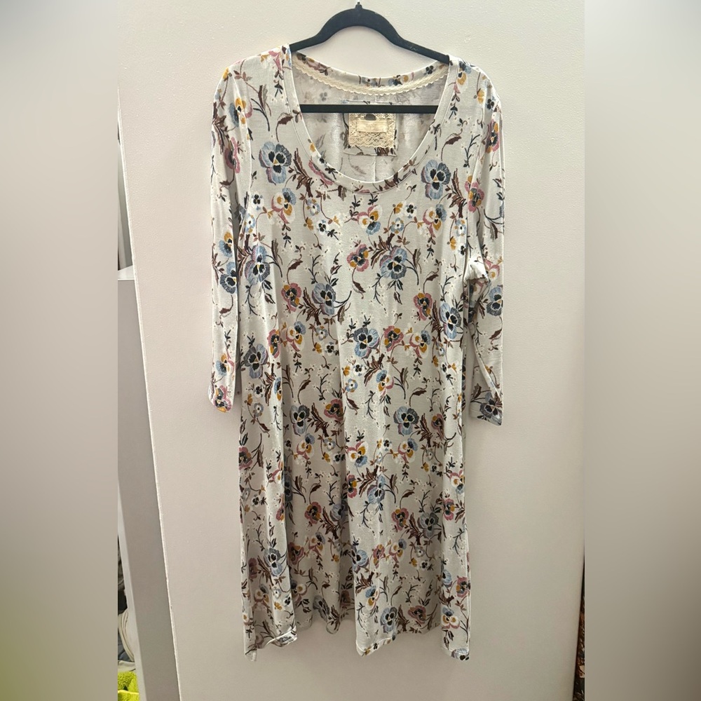 Size large Cupio floral dress!…